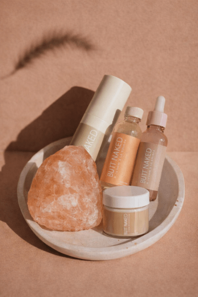 Butt Naked products inside of a bowl